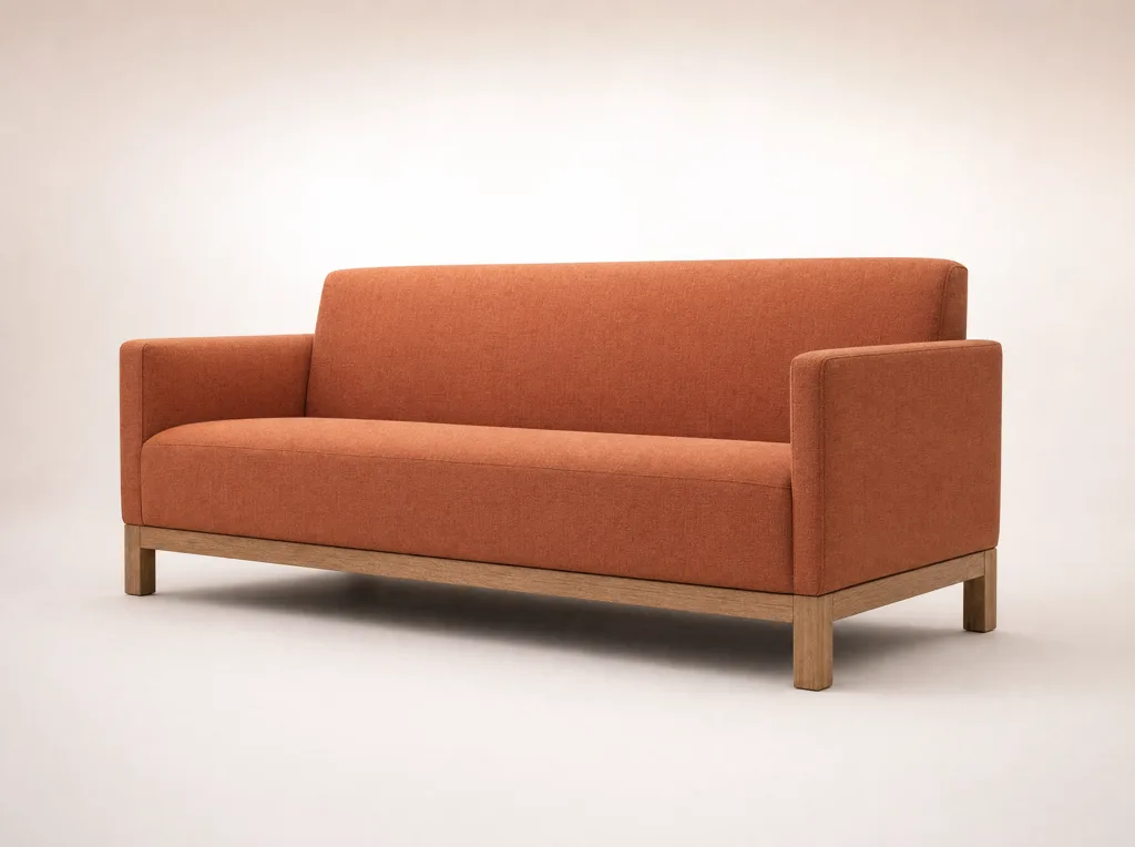 Packshot: terakotowa sofa na białym tle katalogowym